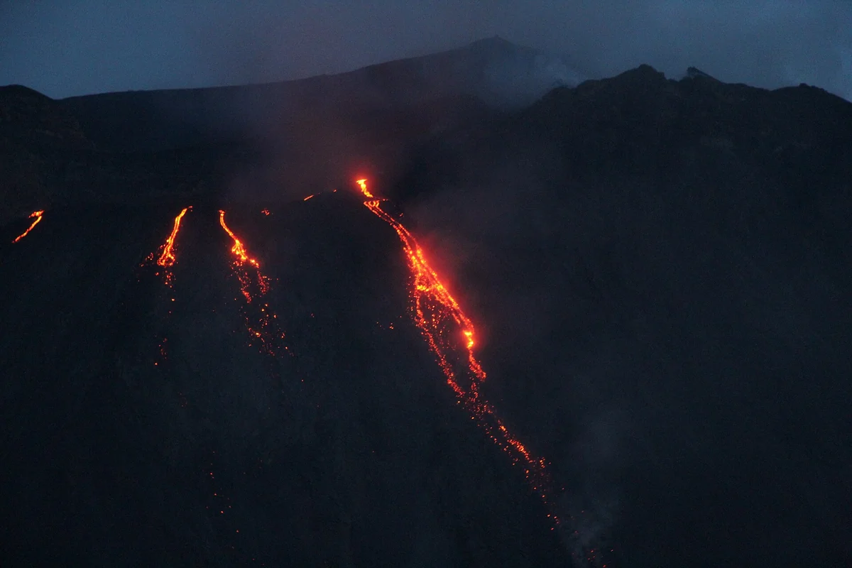 Lava flowing down the Sciara del Fuoco of the Stromboli volcano during an effusive phase, Aeolian Islands, Italy