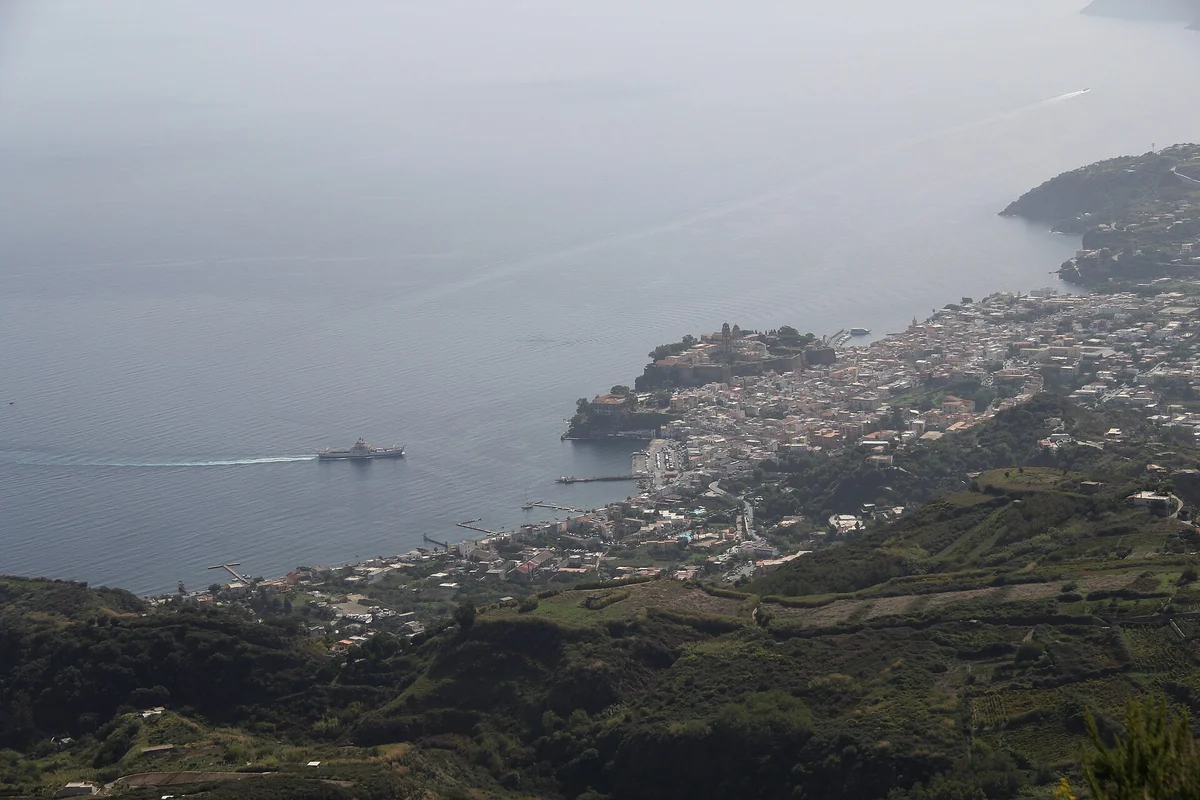 Lipari town seen from above with its harbour and castle, Aeolian Islands, Italy