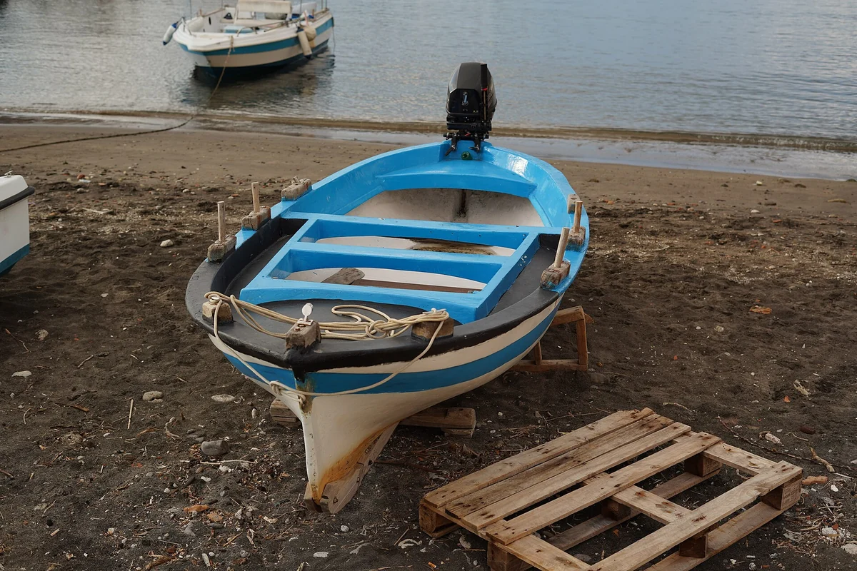 A boat moored at Marina Corta in Lipari, departure point of the small-group Stromboli speedboat tour, Italy