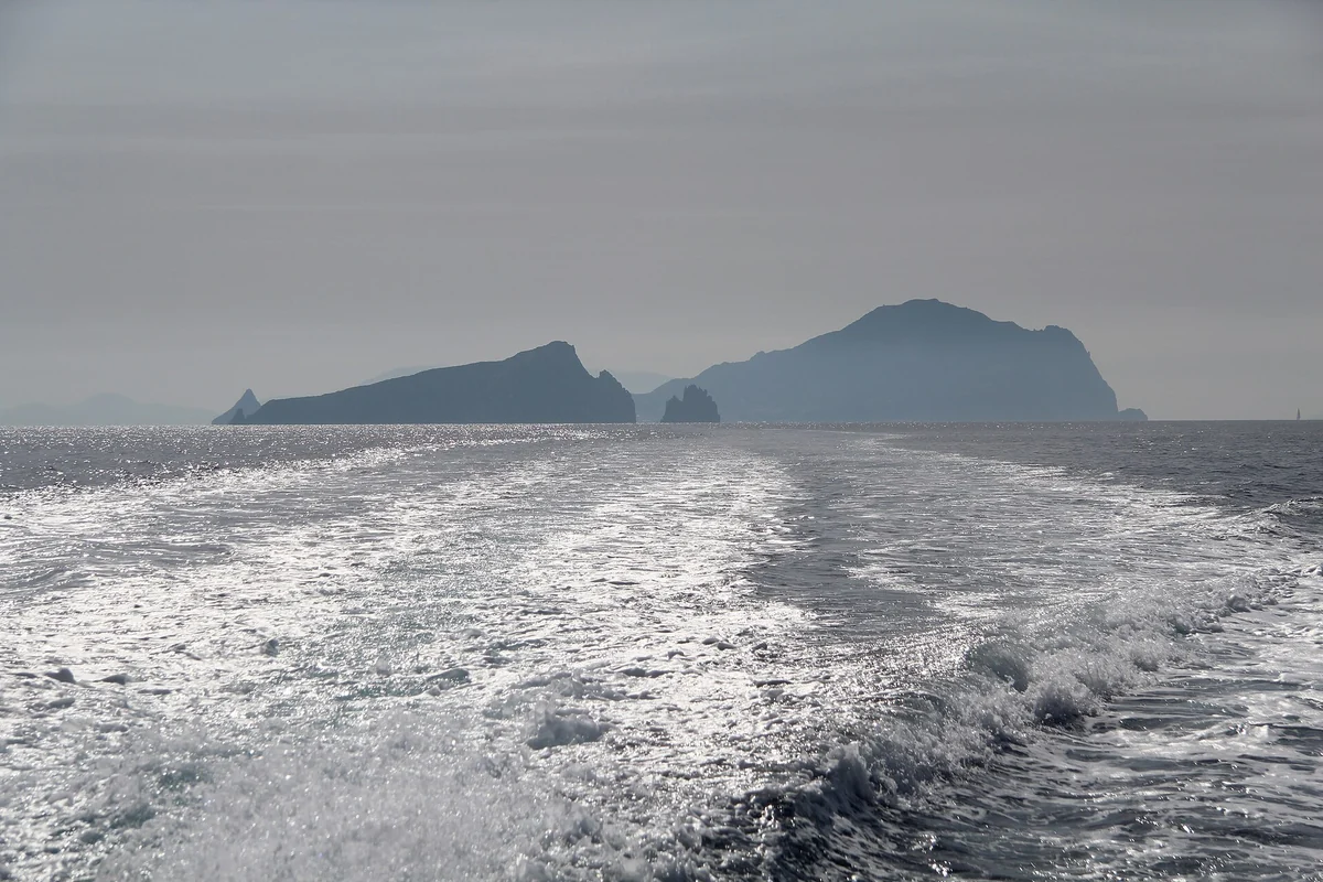 The islets around Panarea island seen from the sea on the crossing from Milazzo, Aeolian Islands, Italy